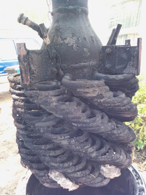 pressure vessel lifted out of the casing; there's a lot of soot.