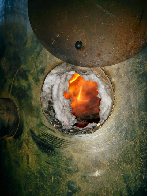 fire seen through lighting hole...