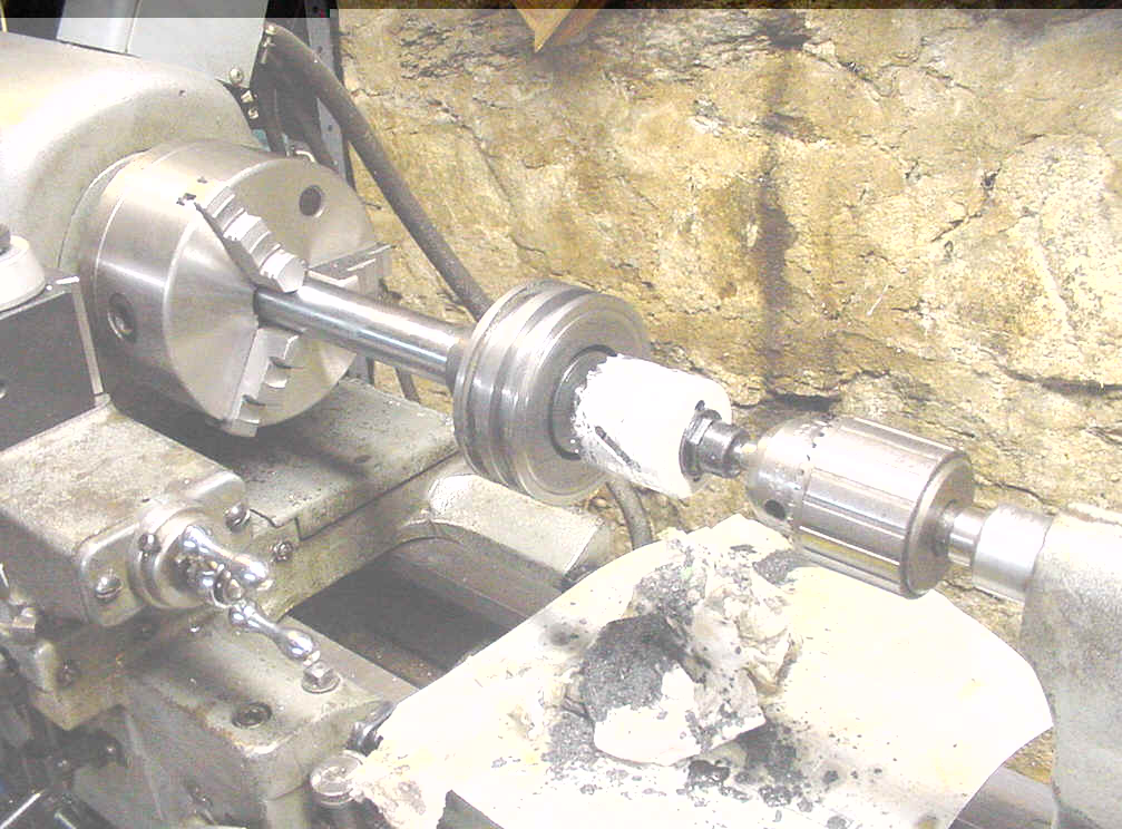 Drilling big piston for removal from big diameter rod