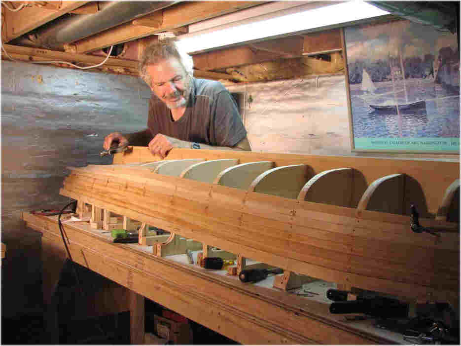 Thin strips nailed to wood frames, 1/4 inch thick soft wood