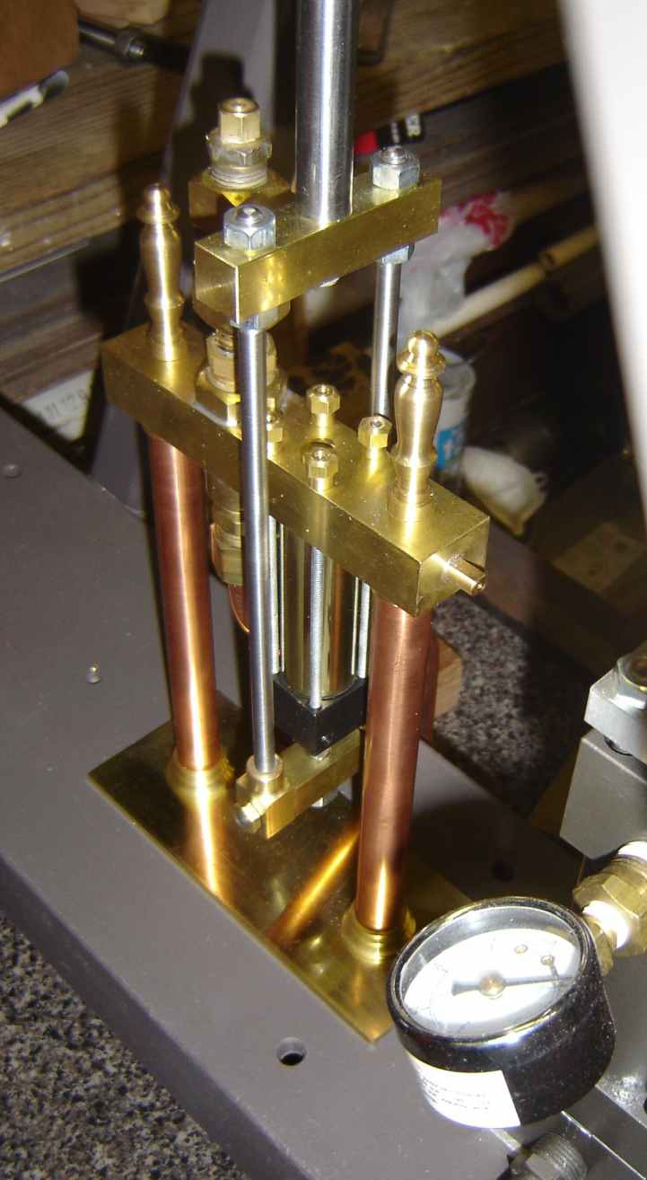 Feed pump uses 1/2 inch teflon balls, spring loaded, for check valves.